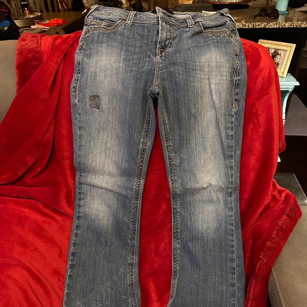 Women's flare light wash jeans w/cross pockets - Size 31